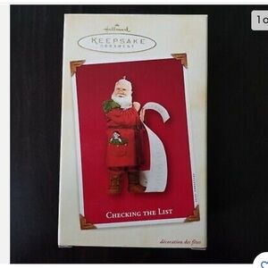 HALLMARK ORNAMENT CHECKING THE LIST 2002